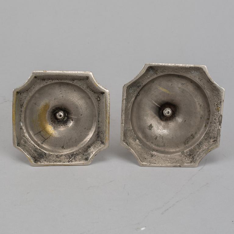 Two Swedish 18th century candlesticks.