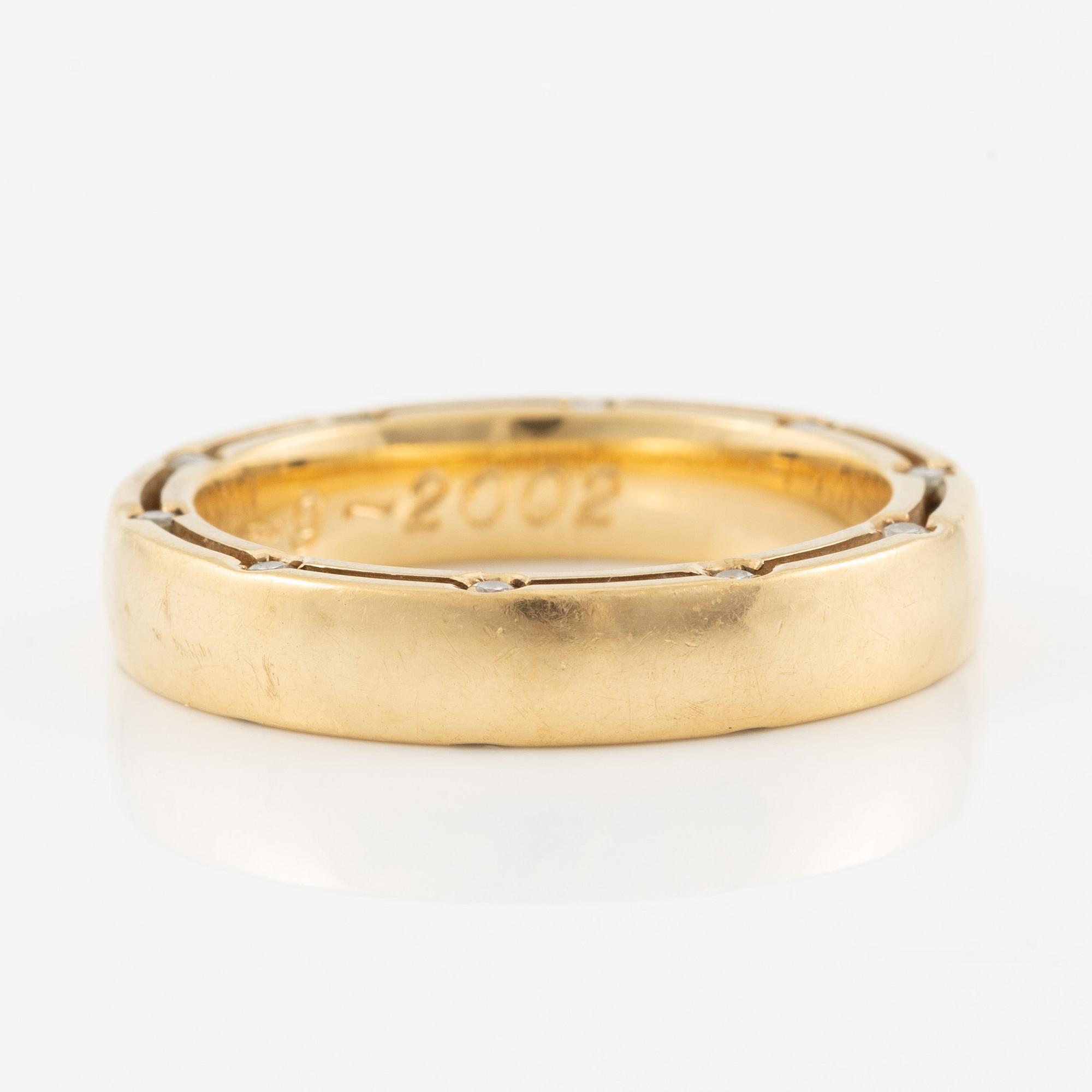 Damiani ring 18K gold with round brilliant-cut diamonds, designed in collaboration with Brad Pitt.