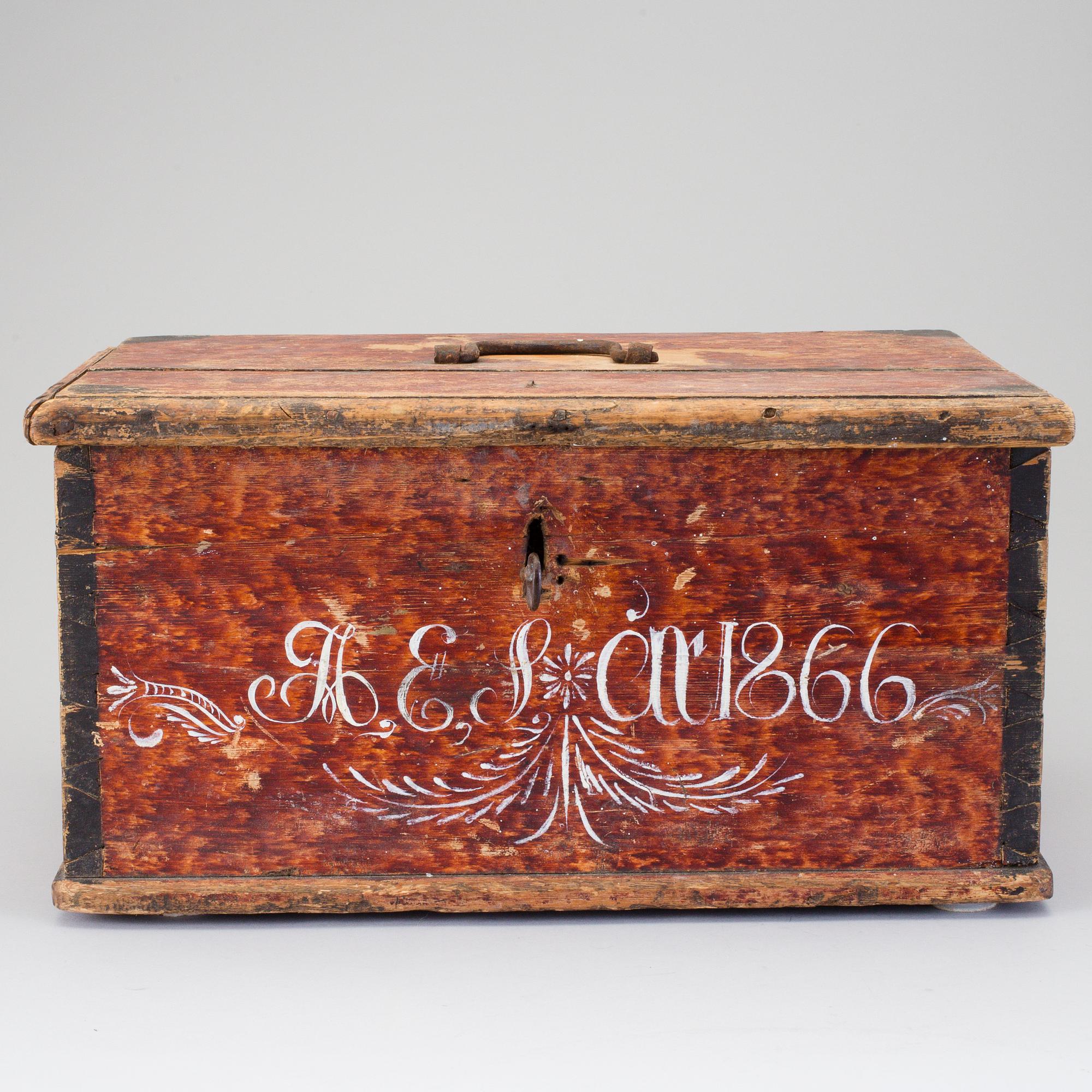 A folk wood box dated 1866.