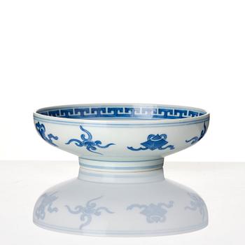 A blue and white heavily potted dish, Republic period with a mark.