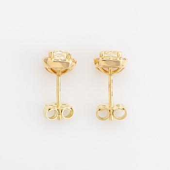 Light yellow diamond earrings.