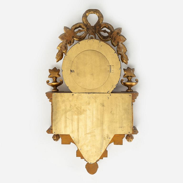 A  late Gustavian style wall clock, early 20th century.