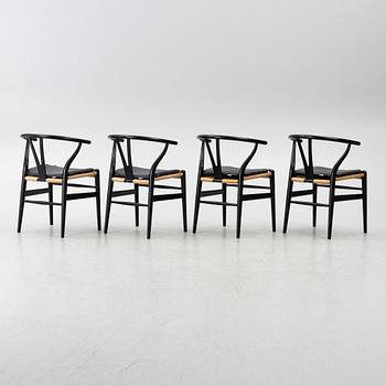 Hans J. Wegner, four CH24/ "Wishbone" chairs, Carl Hansen & Son, Denmark, 21st century.