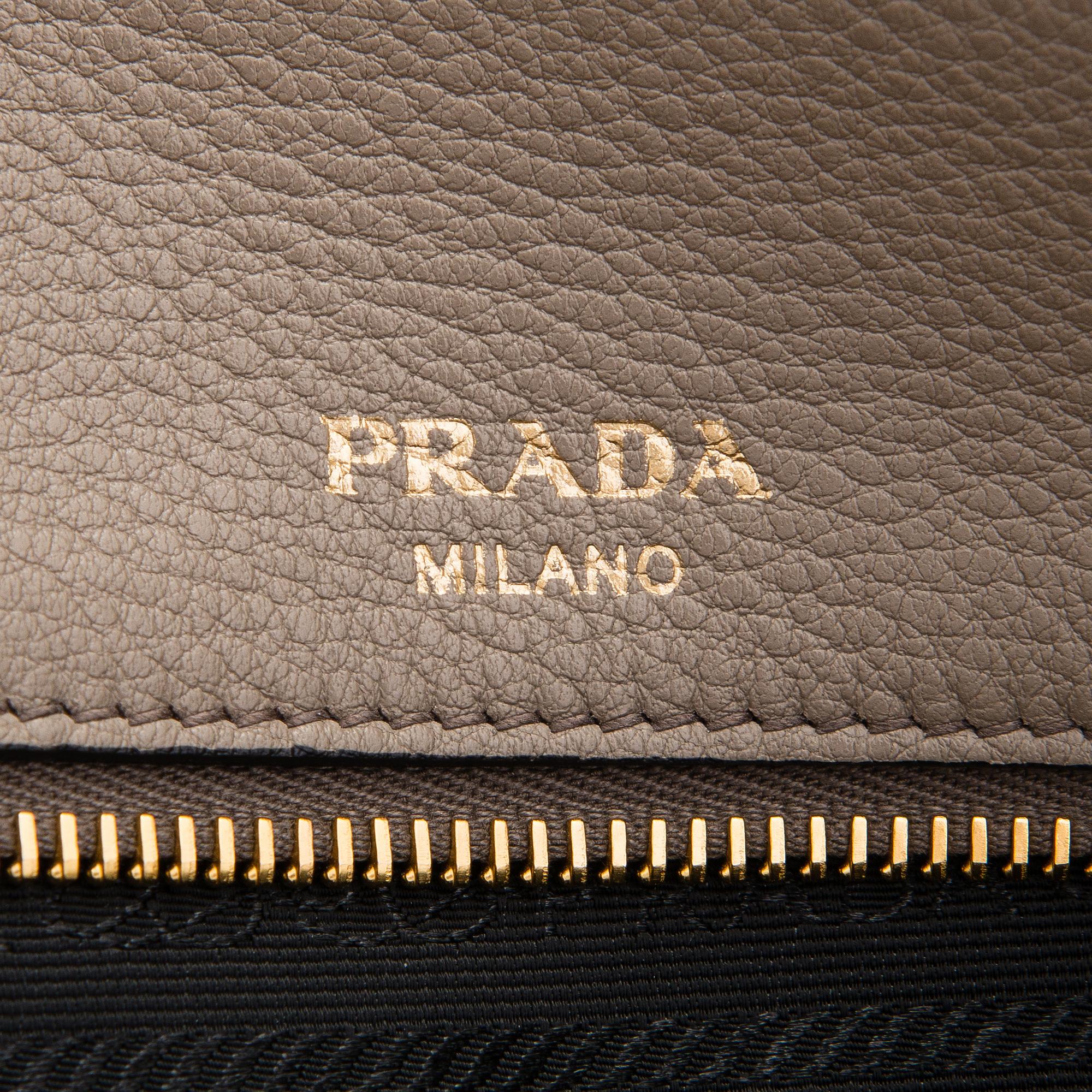 Prada, a clay gray leather handbag, 2020.