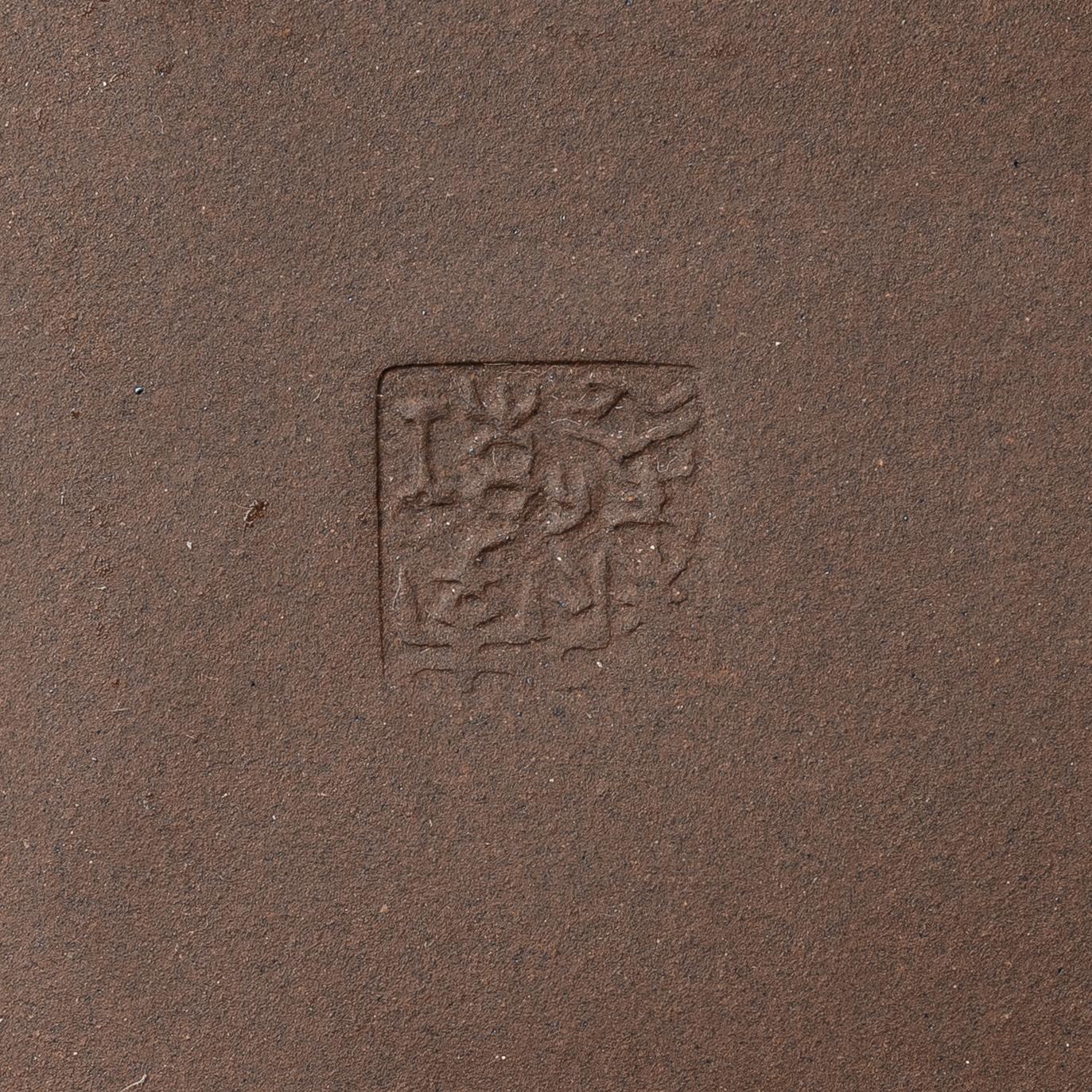 A group of four square yixing teapots, China, 1970/80s.