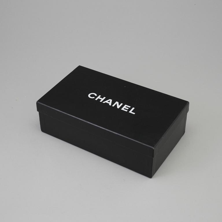 CHANEL, a pair of black plastic sandals. Size 38.