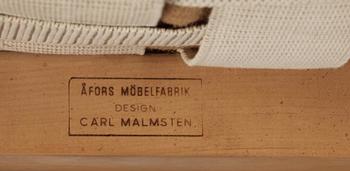 KARMSTOLAR, 2st, snarlika, varav minst en modell "Gustavus", Carl Malmsten för Åfors Möbelfabrik.