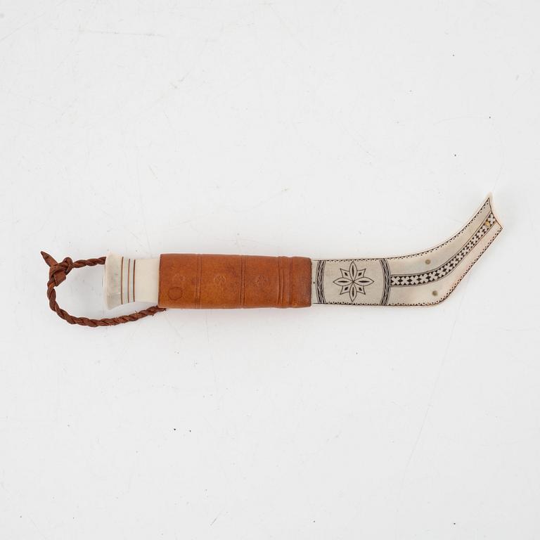 Jon Tomas Utsi, a reindeer horn knife, signed.