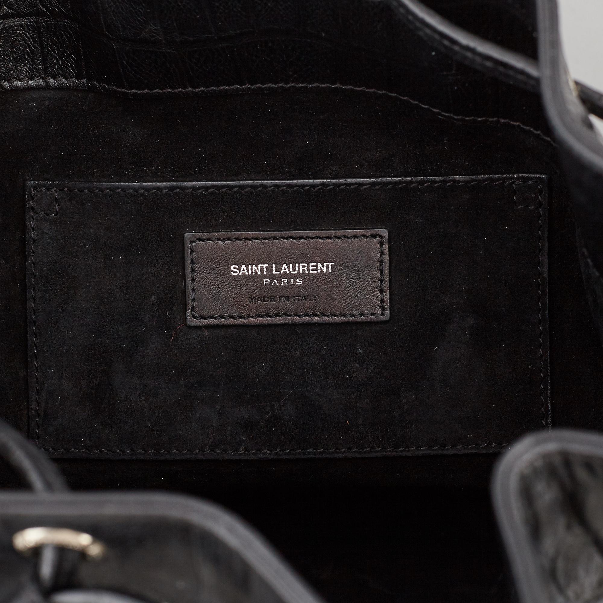 YVES SAINT LAURENT, a black leather 'Emmanuelle' bag.