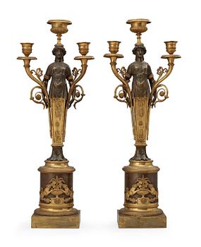 A pair of Swedish Empire early 19th century three-light candelabra.