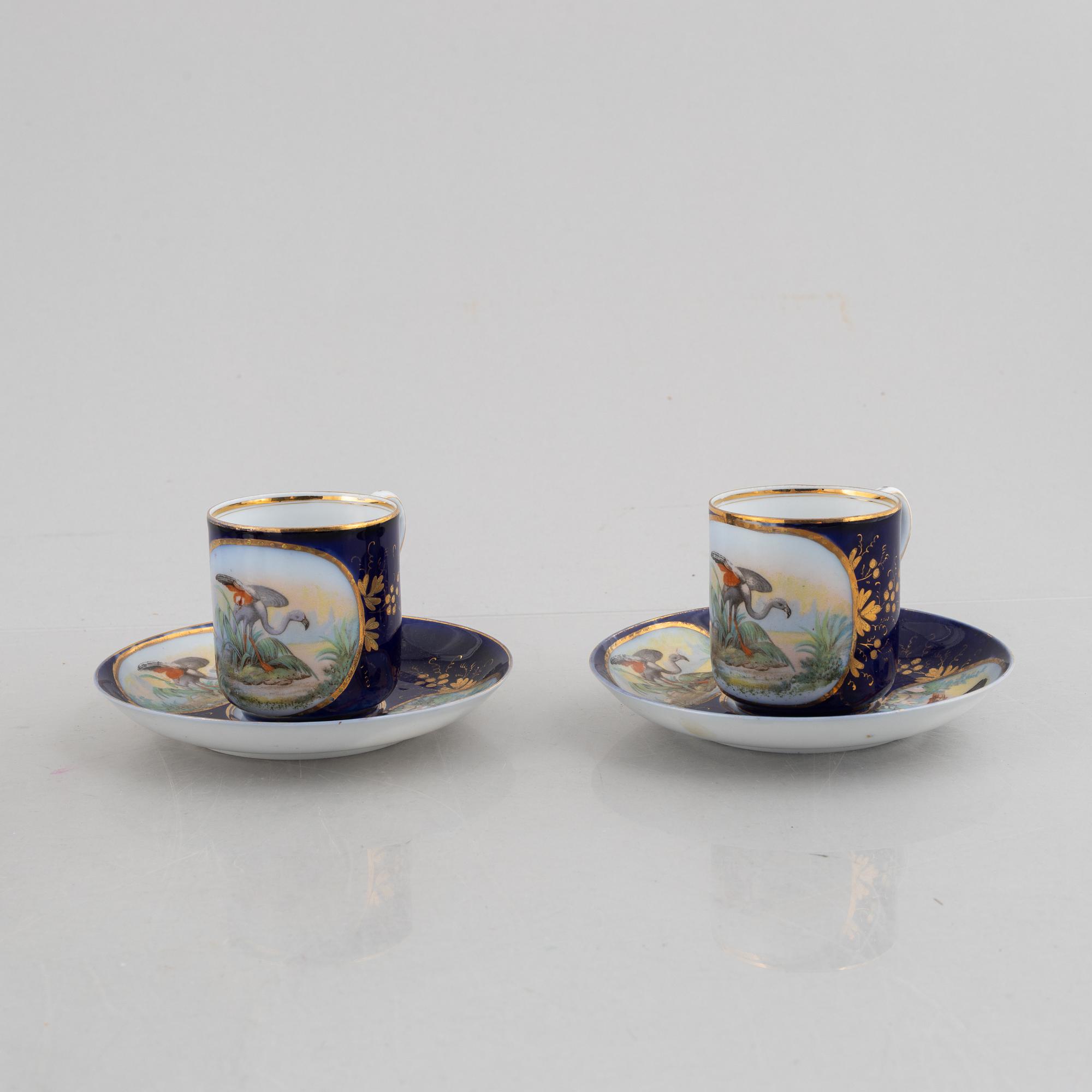 A set of nine porcelain coffee cups with saucers, Kuznetsov, Russia (1891-1917).