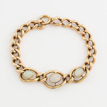 Gold and three opal bracelet.