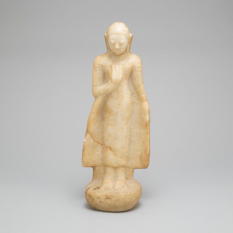 A south east asian buddha figure, 20th Century.