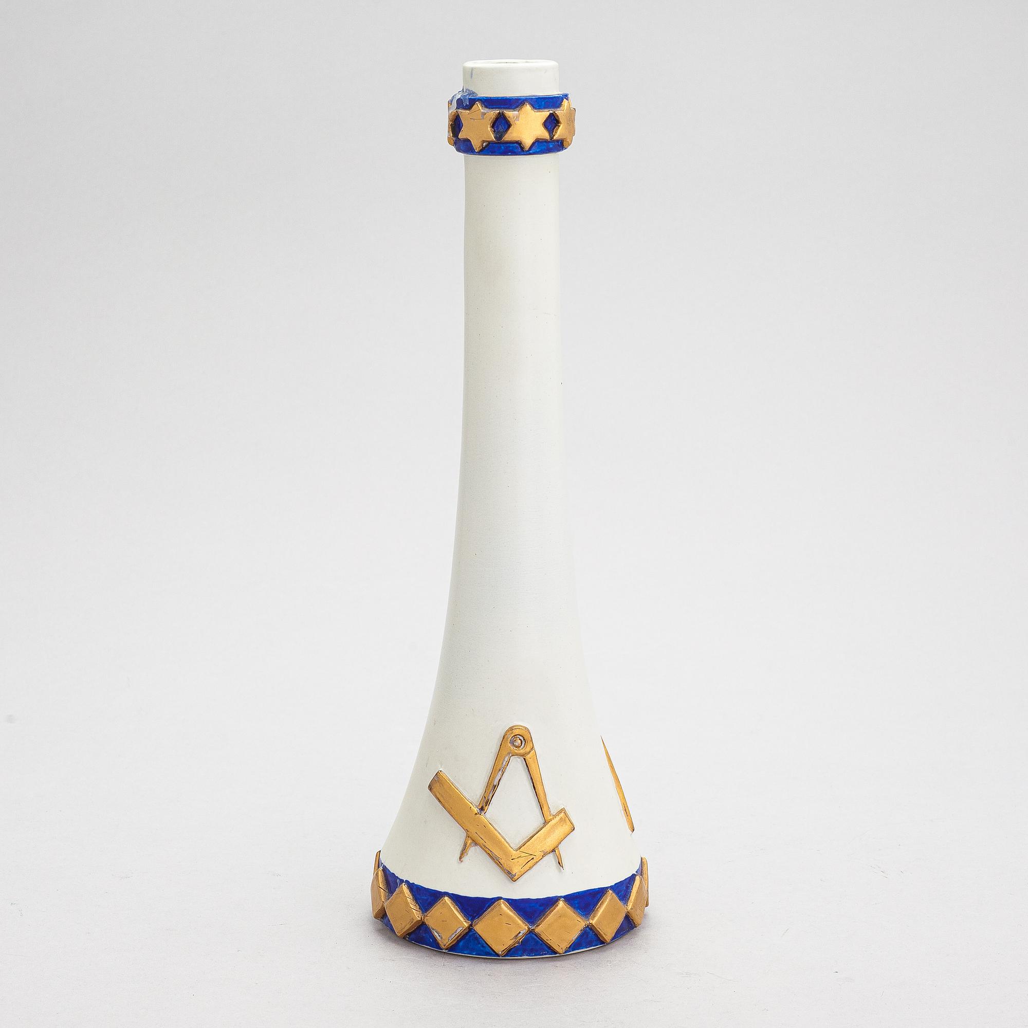 Taisto Kaasinen, a ceramic vase with Masonic symbols, signed Kaasinen Arabia Finland.
