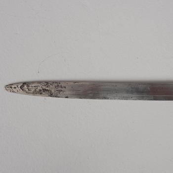 Polissabel, 1900-talets början, med balja.