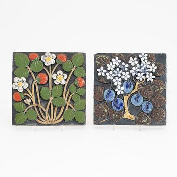 Lisa Larson, a group of three stoneware wall reliefs and two ashtrays, Gustavsberg.