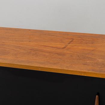 A teak sideboard with black details, by Troeds Sweden, 1960's.