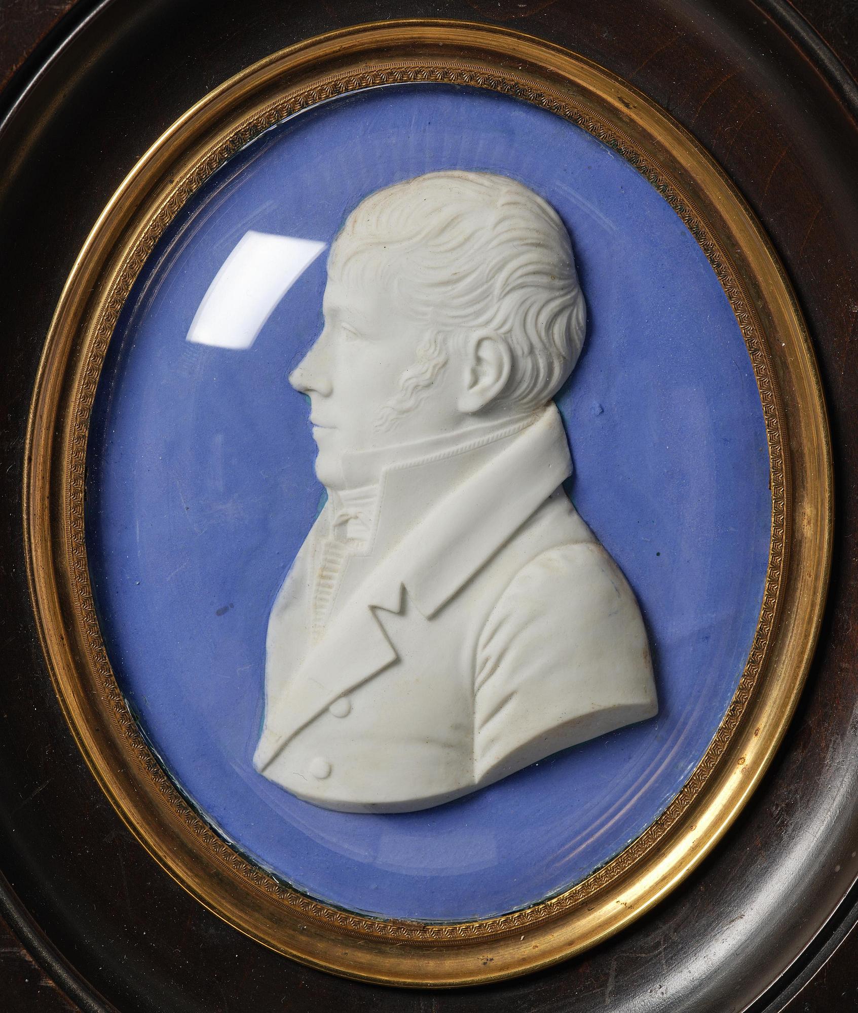 A pair of Sèvres biscuit plaques by Alexandre Brachard (1775-1843), dated 1812.