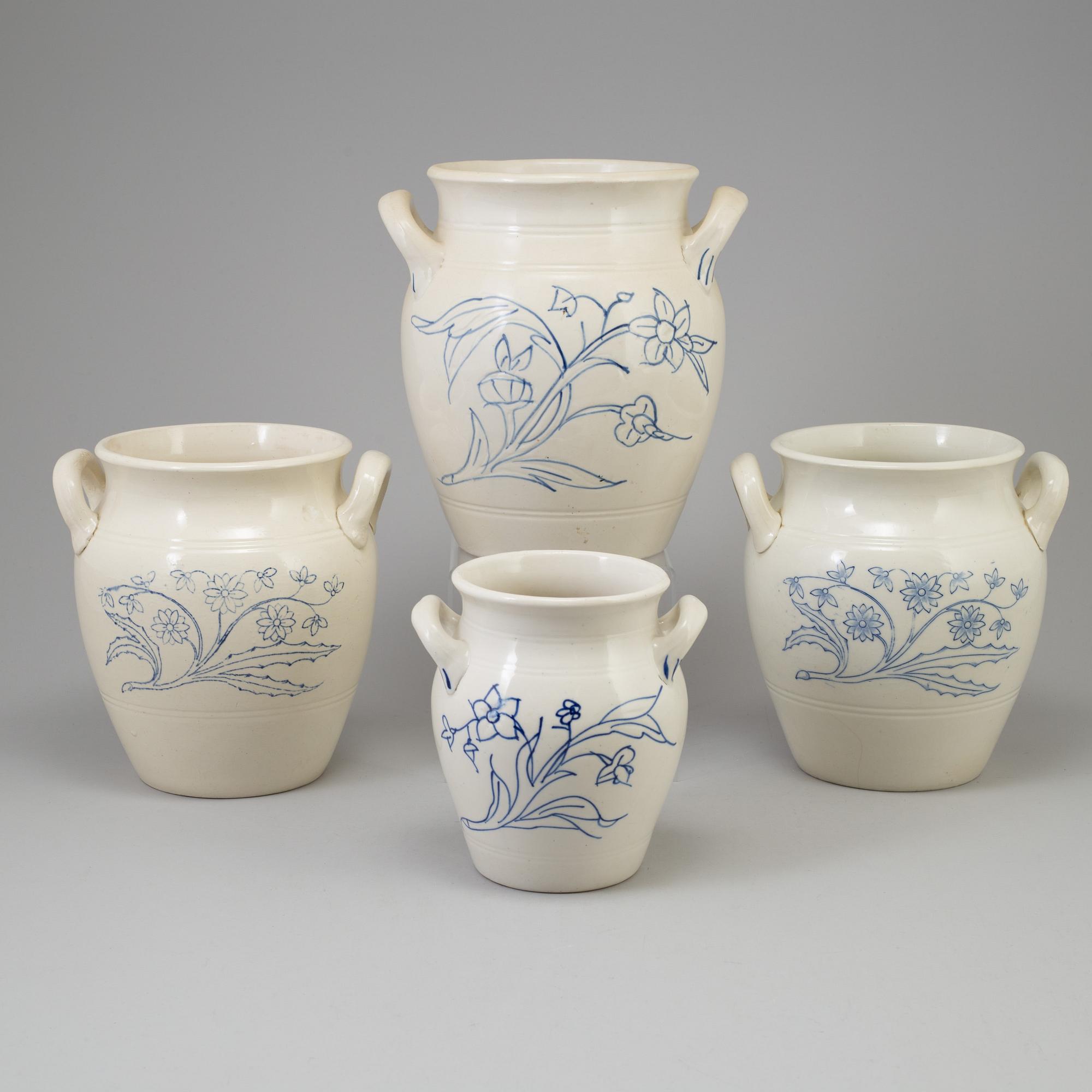 A set of four 20th century blue and white jars by Rörstrand.