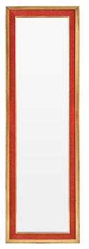 304. A Svenskt Tenn mirror, the frame with red fabric and gilding.