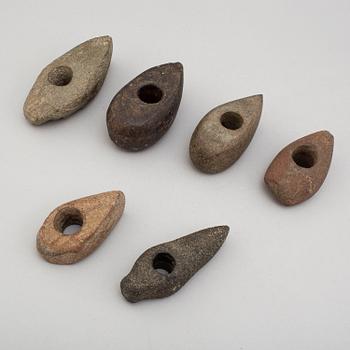 Six neolithic stone axes.