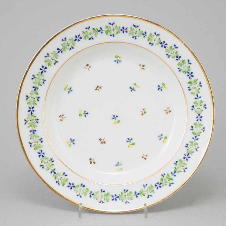 A French dinner service, circa 1800, some pieces marked M F Guerhard & Dahl.  (70 pieces).