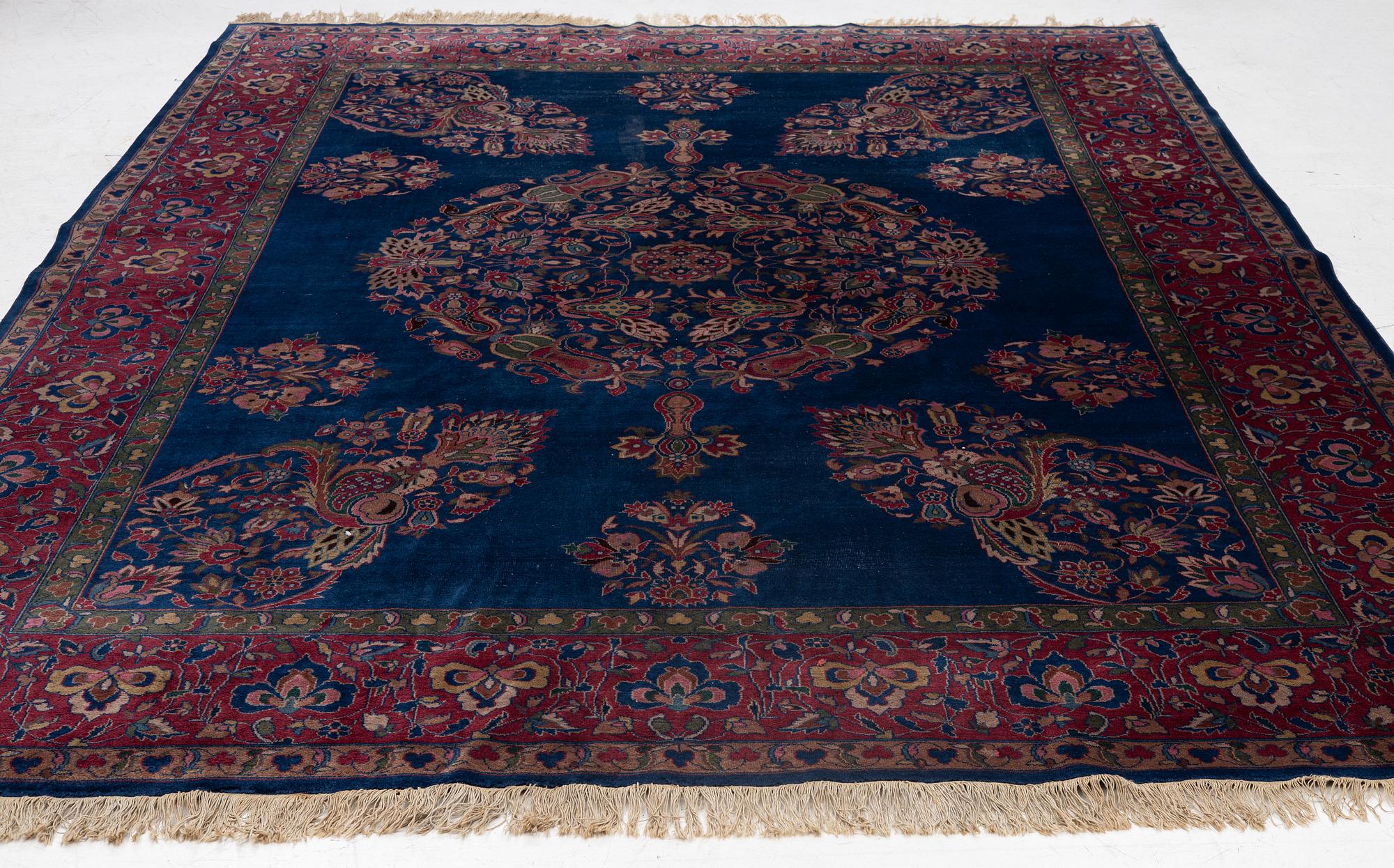 A semi-antique Amritsar carpet, north India c. 359 x 272 cm.