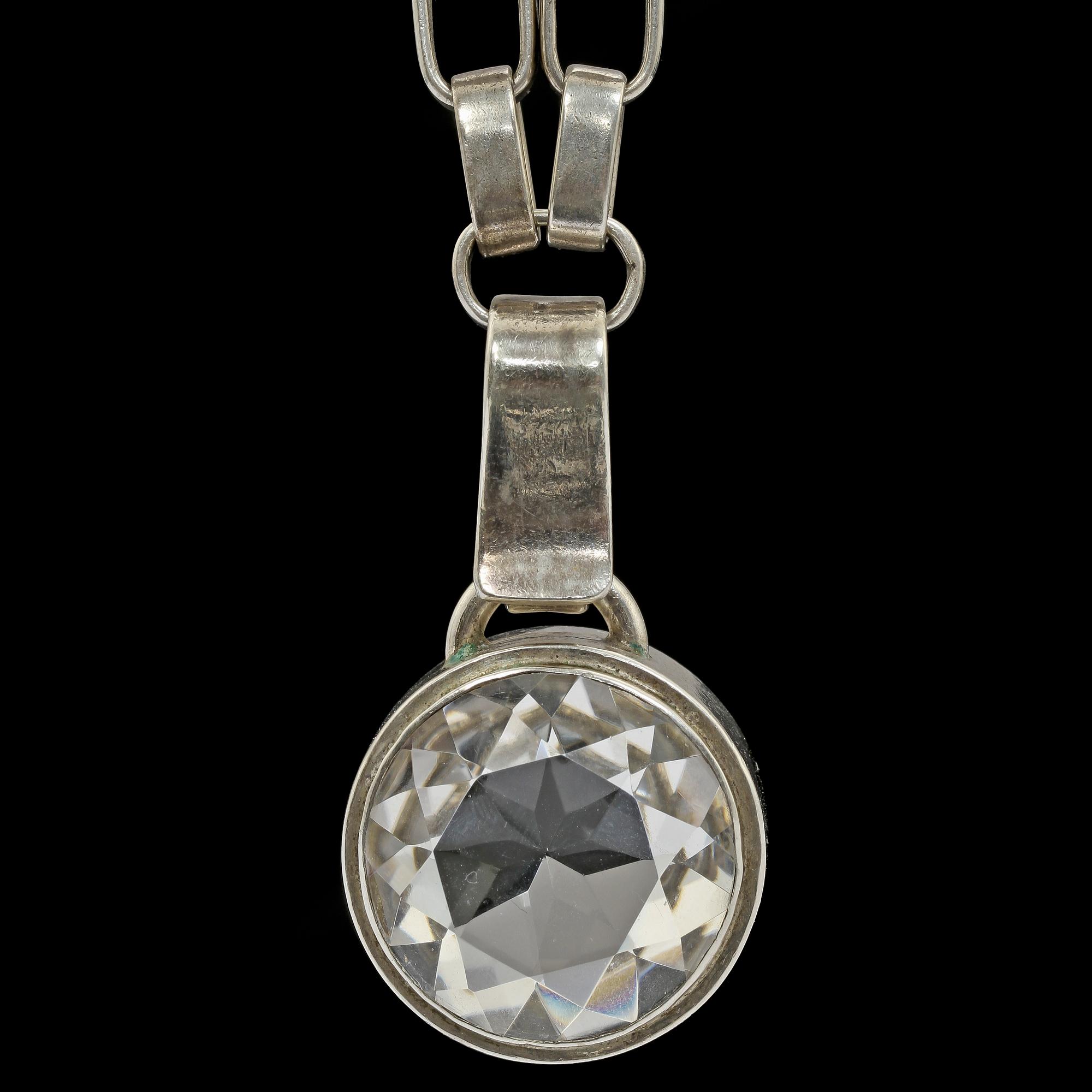 HALSKEDJA samt HÄNGE, sterlingsilver samt bergskristall, Sven-Erik resp Anders Högberg, Göteborg, 1976/77. Vikt 131g.