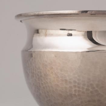 Tapio Wirkkala, a sterling silver bowl, Finland 1973, and Eric Löfman, a silver beaker, MGAB, Sweden 1975.