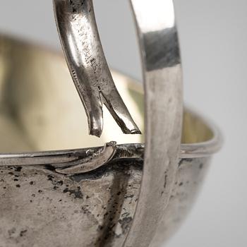 A pair of firt half of the 19th century parcel-gilt silver salt-cellars by an uknown master, one marked HB.