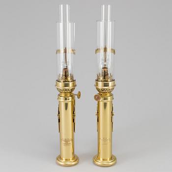 A pair of brass kerosene lamps, GV Harnisch Eftr, Copenhagen, 20th century.
