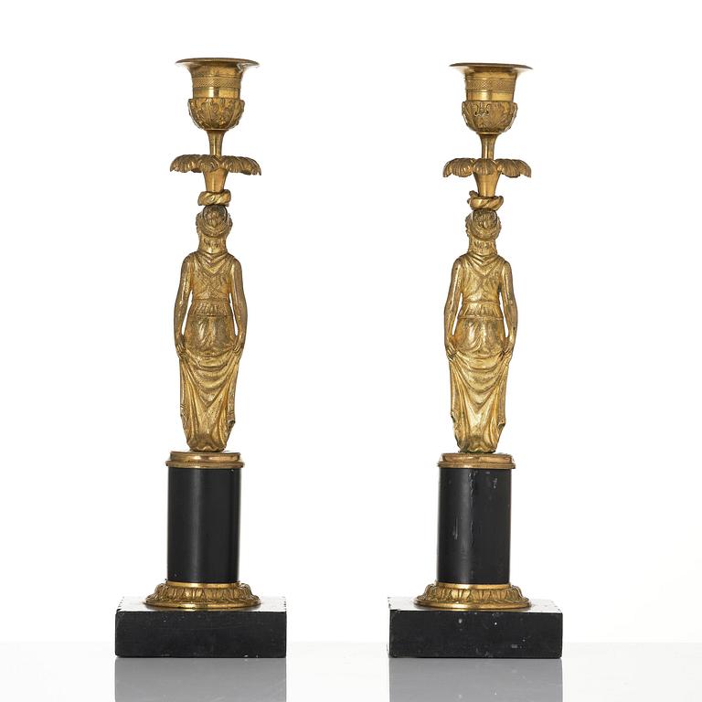 A pair of late Gustavian marble and ormolu candlesticks attributed to F. L. Rung (1758-1837).