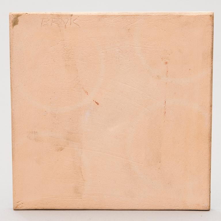 A stoneware relief signed BRYK.