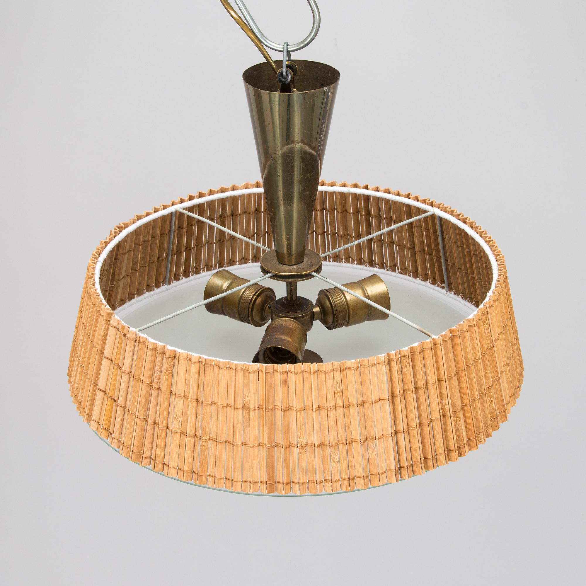 Taklampa, Idman 1900-talets mitt.