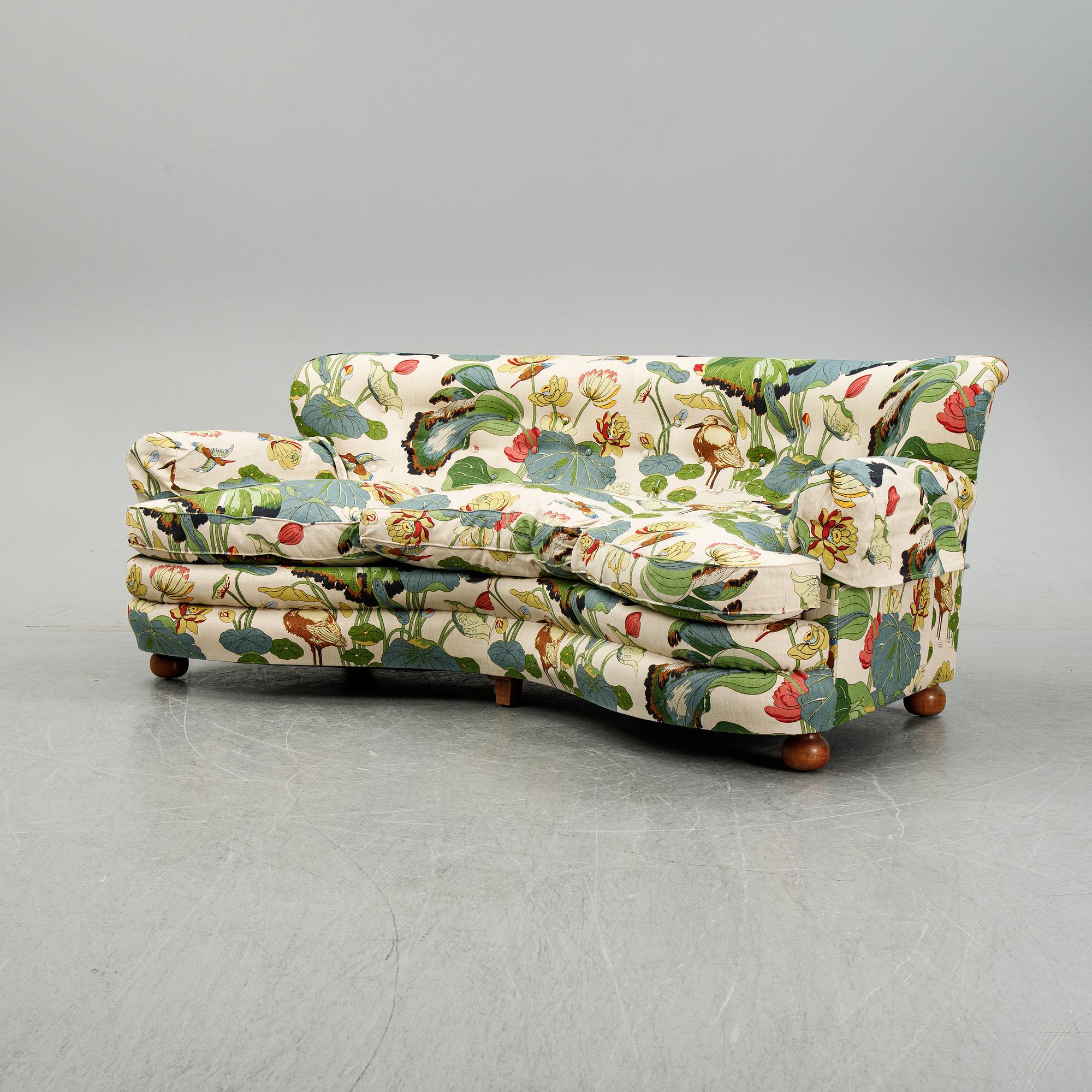A model 968 sofa by Josef Frank for Firma Svenskt Tenn.