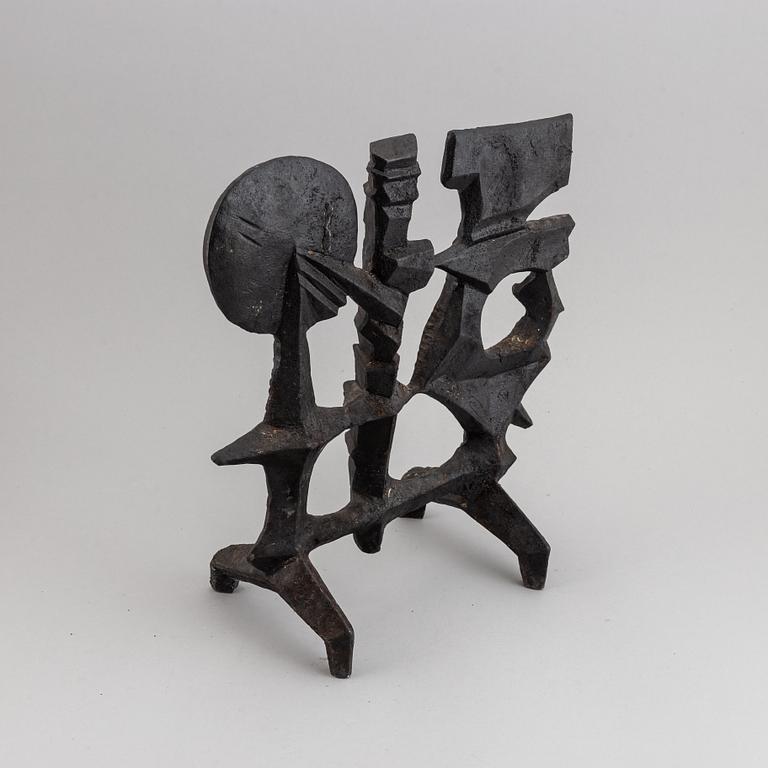 OLLE HERMANSSON, a cast iron sculpture, marked Husqvarna.