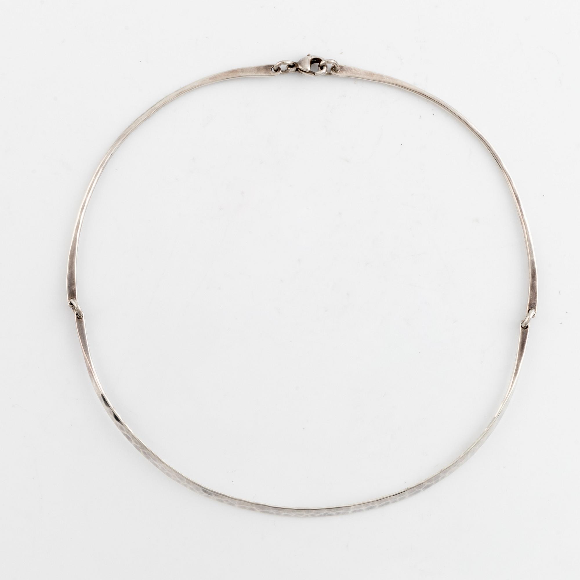 Annie Jägbeck silver necklace and earrings.