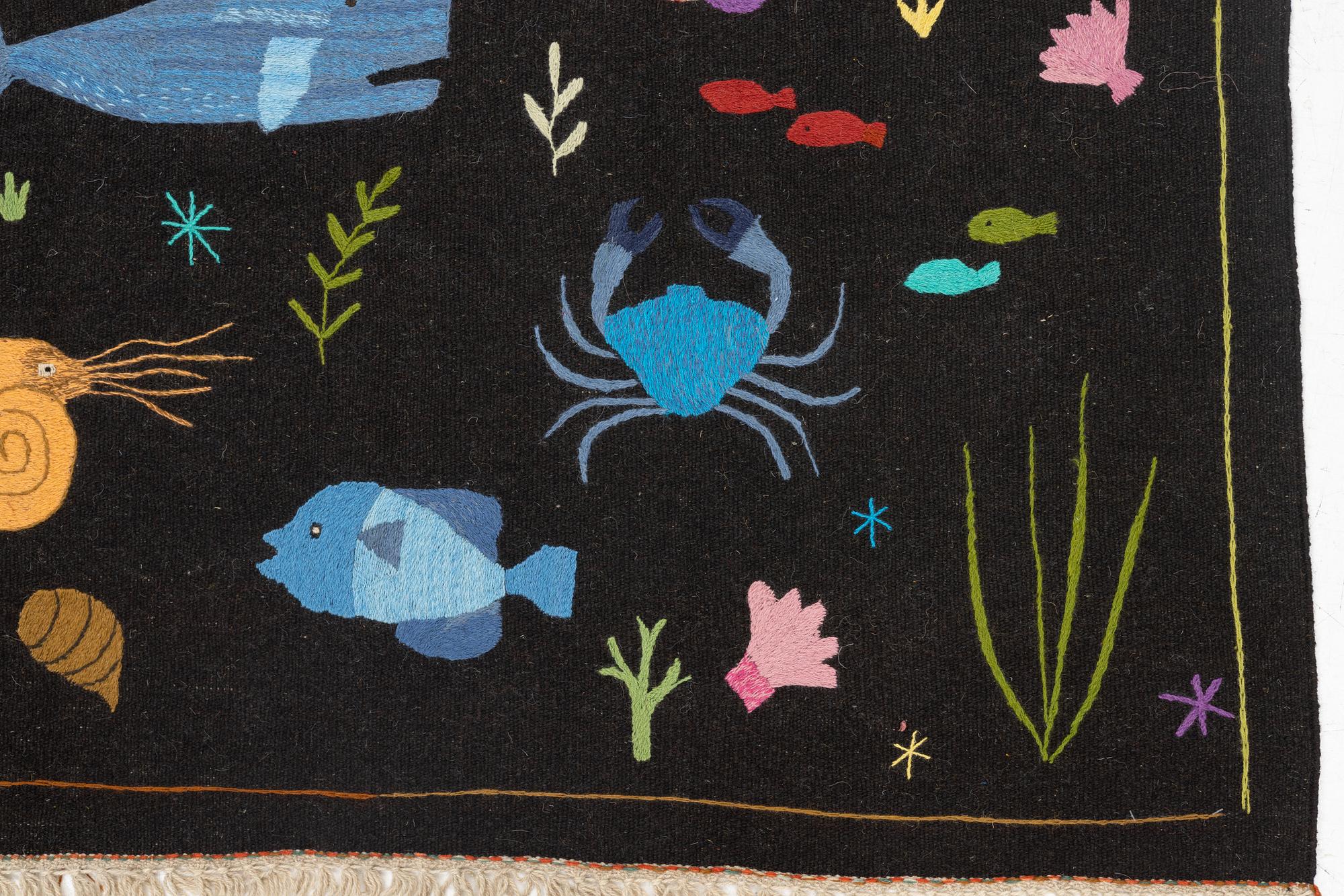 A hand-embroidered Kilim rug, c. 200 x 155 cm.