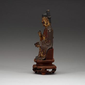 A seated figure of a daoist dignitary, Ming dynasty (1368-1644).