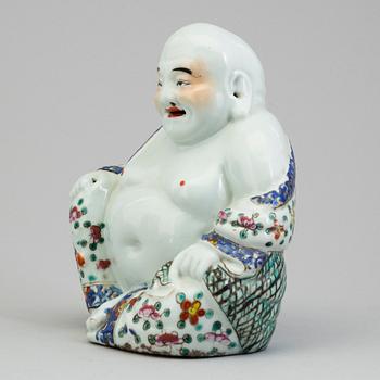 A Chinese 20th century porcelain Buddha.