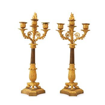 1442. A pair of French Empire early 19th century four-light candelabra.