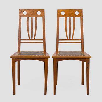 Dining table and six chairs, early 1900.