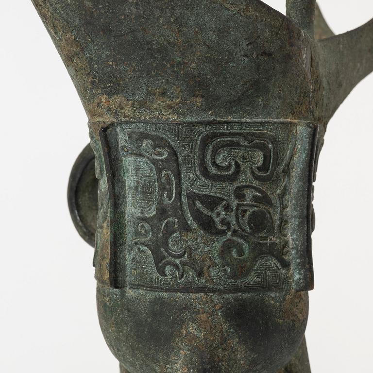 An archaisitic bronze Jue vessel, Qing dynasty.