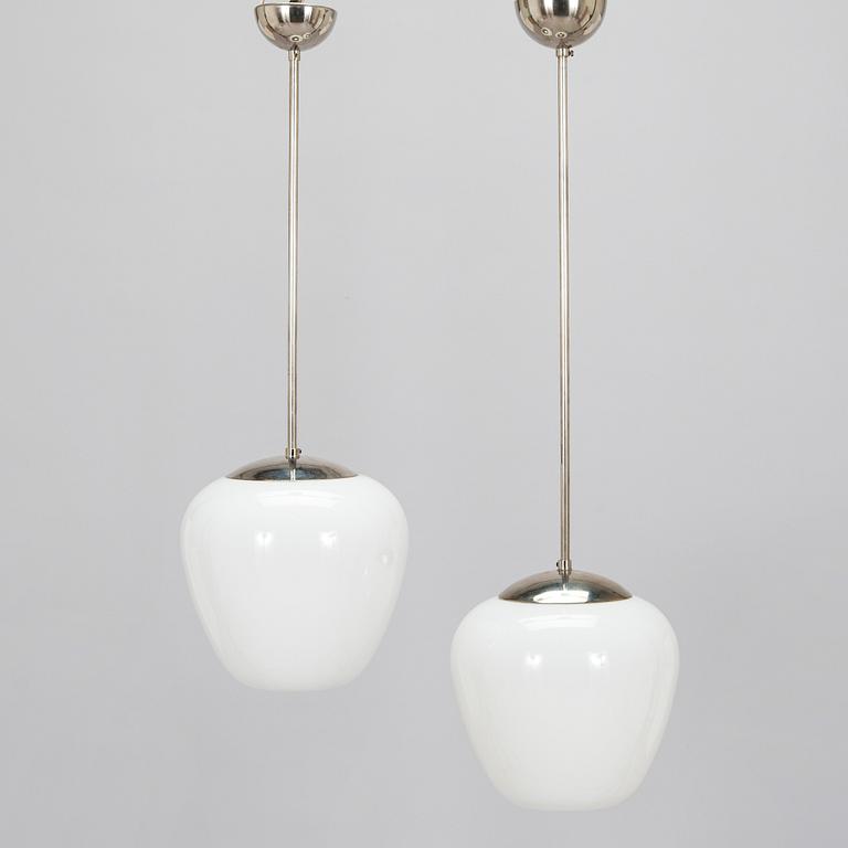 Gunnel Nyman, two 1940's pendant '81003' lights for Idman.