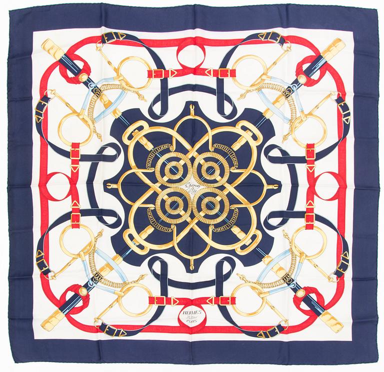 An 'Eperon d'Or' silk scarf.