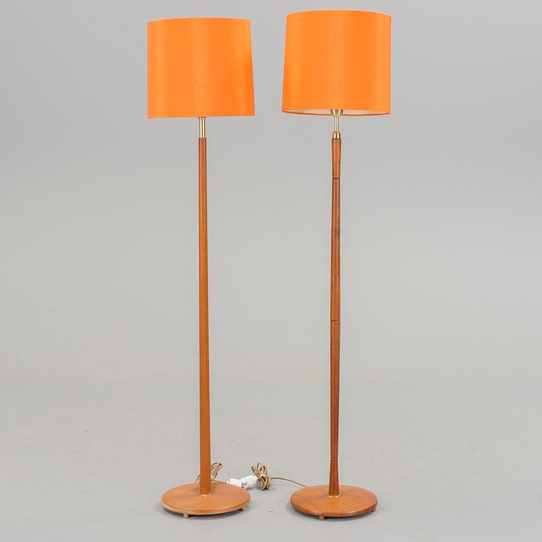 Two floor lamps in teak and brass from the 1960s/70s.