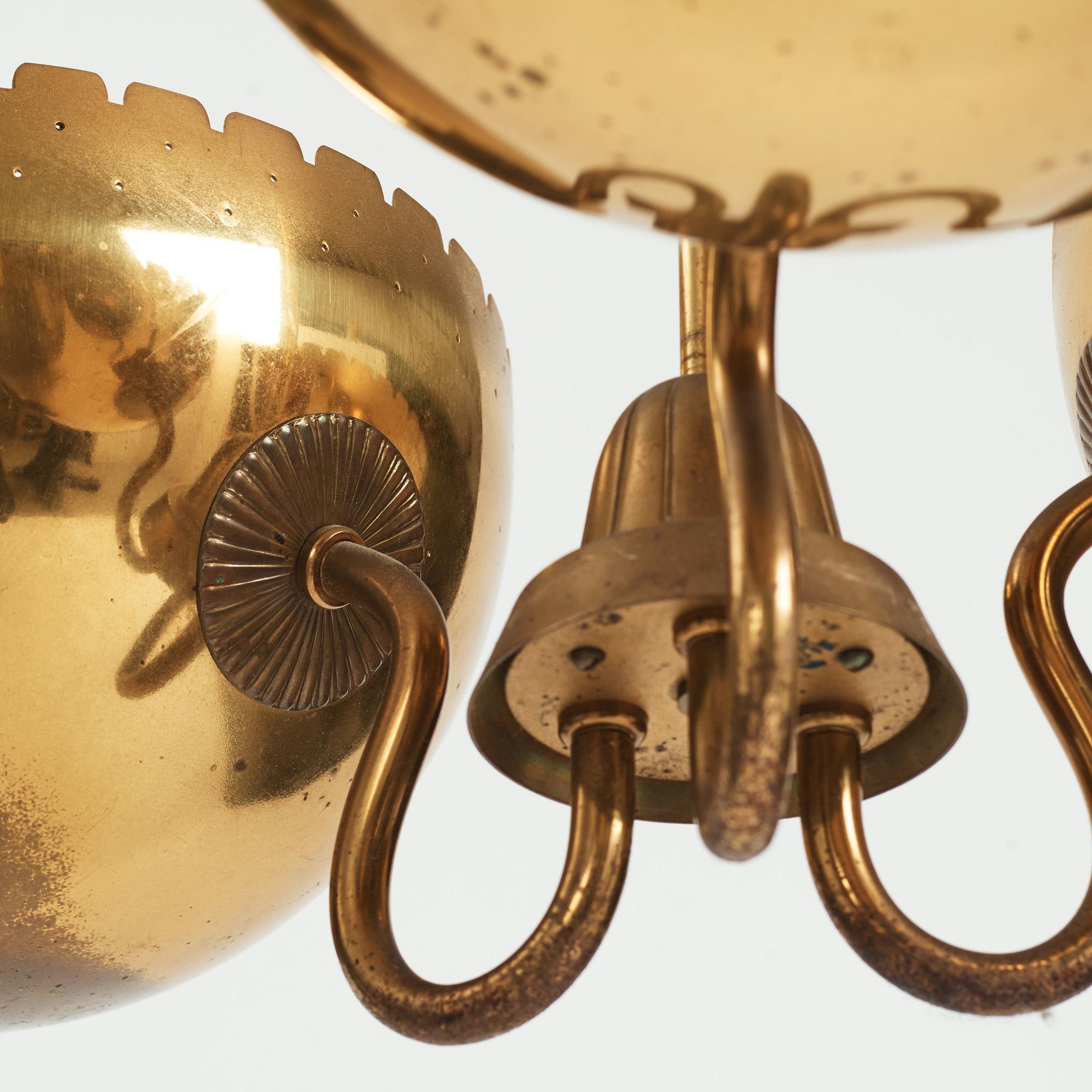 Carl-Axel Acking, probably, a Swedish Modern three light brass ceiling light, Arvid Böhlmarks Lampfabrik, 1940's.