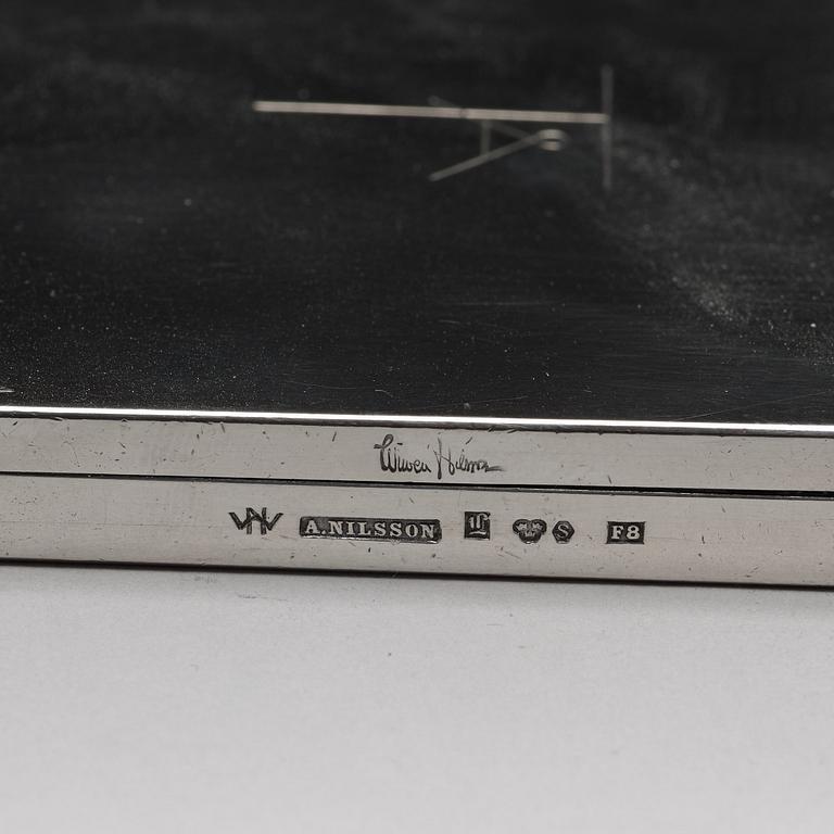 Wiwen Nilsson, a silver set with a pair of candlesticks and a cigarette case, Lund Sweden 1927-38.
