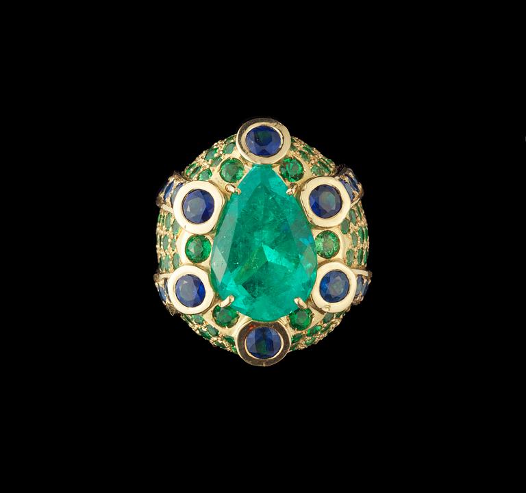 A Sazingg, Irene Zingg, large drop cut emerald, app. 8 cts, tsavorite and blue sapphire ring.