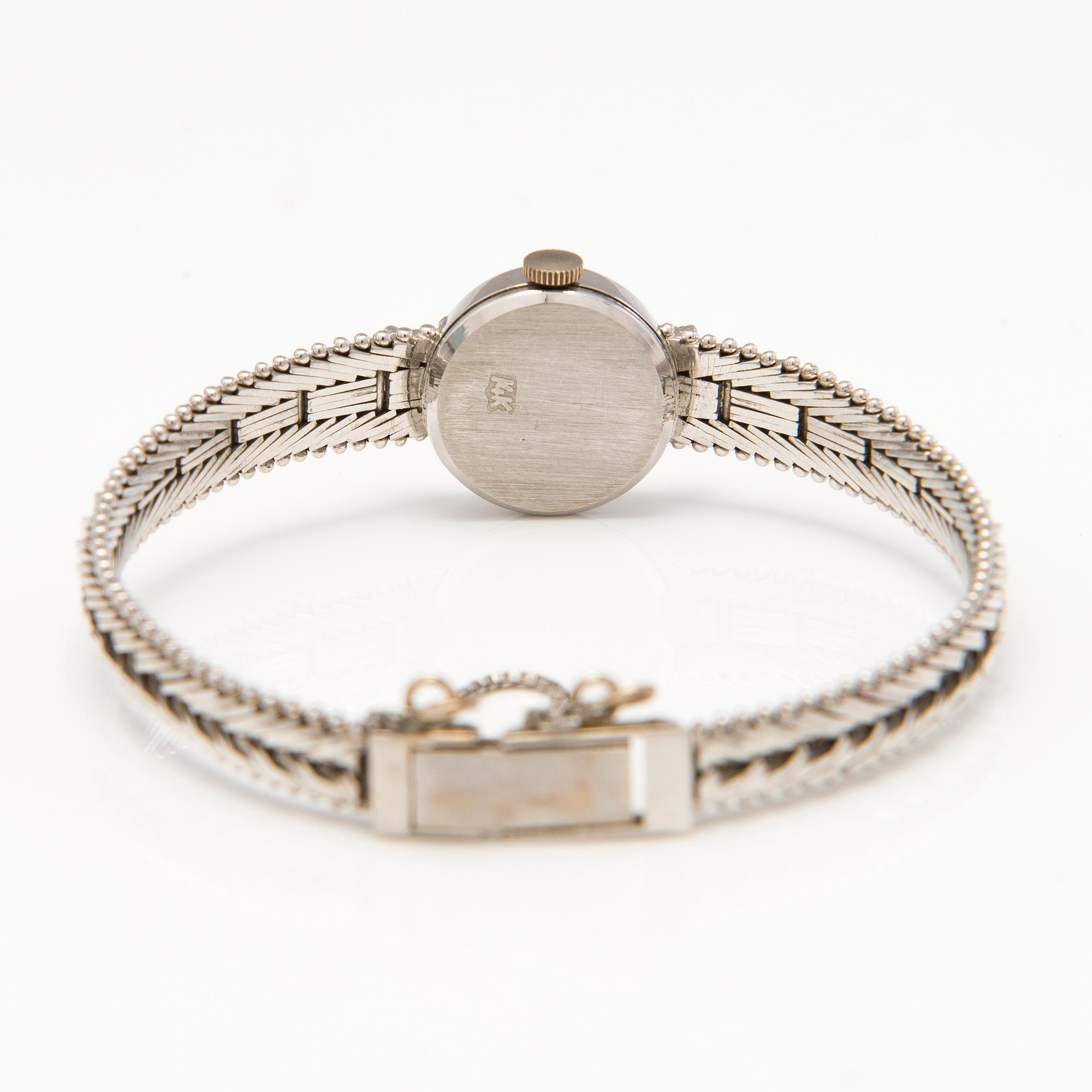 HILSON wrist watch, manual winding, 14K white gold, diamonds ca. 0.11 ct in total, 16 mm.